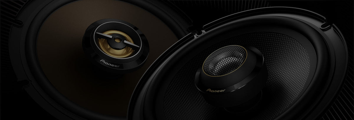 two speaker on dark background