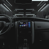 Car interior with a focus on the dashboard and steering wheel.