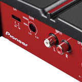 Close-up of a Pioneer audio device with red and black design.