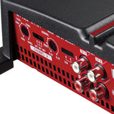 Close-up of a red electronic device with control knobs and labels on a white background