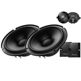 Set of car speakers and amplifier on a white background