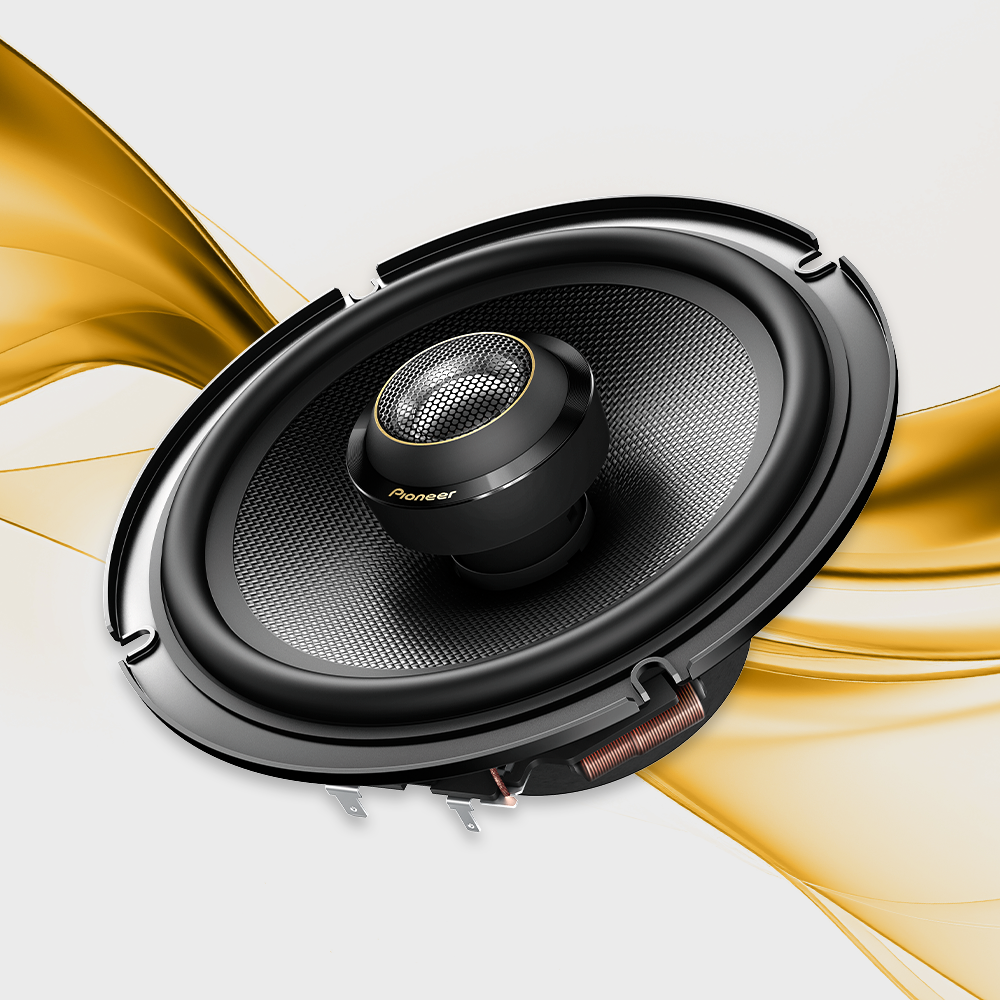 angled speaker on gold and white background