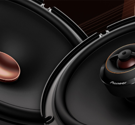 Close-up of a Pioneer speaker with a dark background