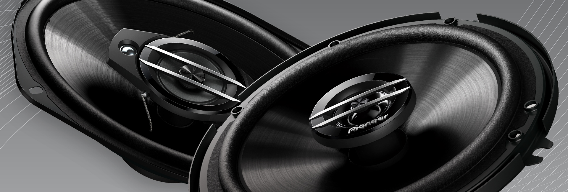 two speakers on gray background