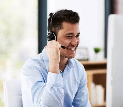 happy man with phone headset on call